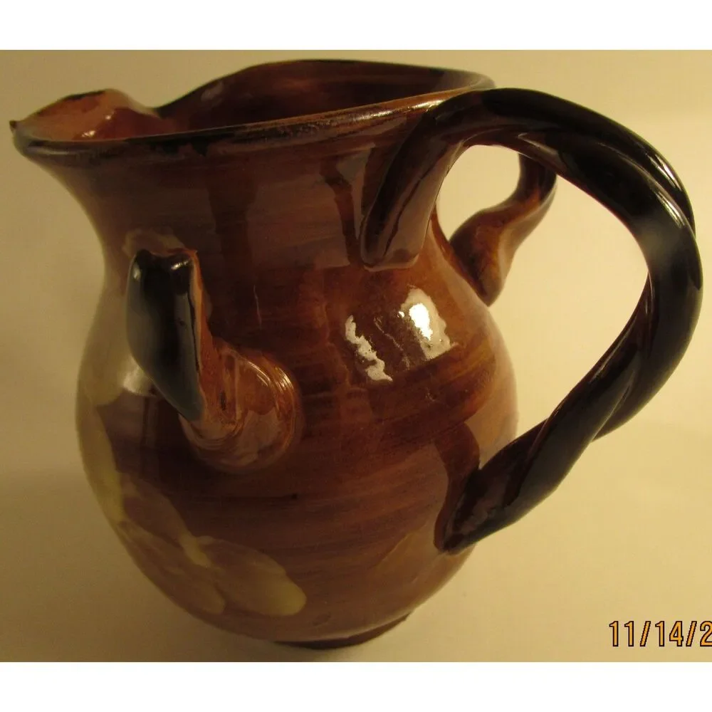 Studio Pottery Creamer brown glazed with flowers artist signed braided handle